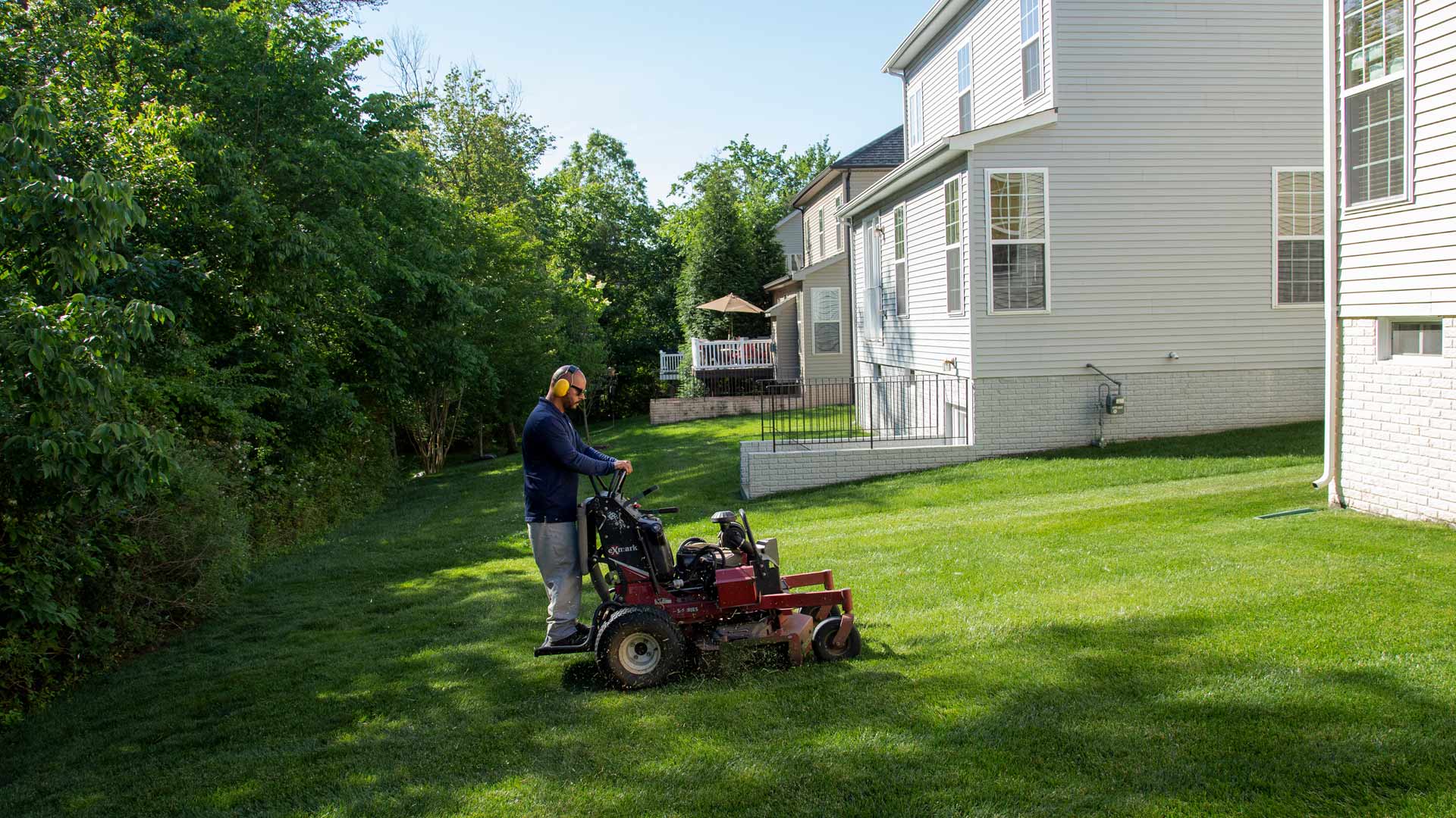Hambleton Lawn & Landscape professional servicing lawn in South Riding, VA.